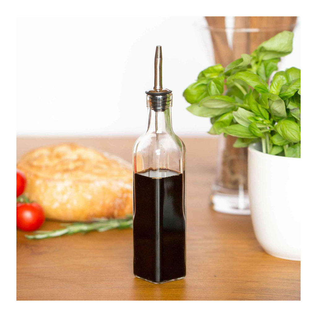 Filled olive oil bottle with balsamic vinegar.