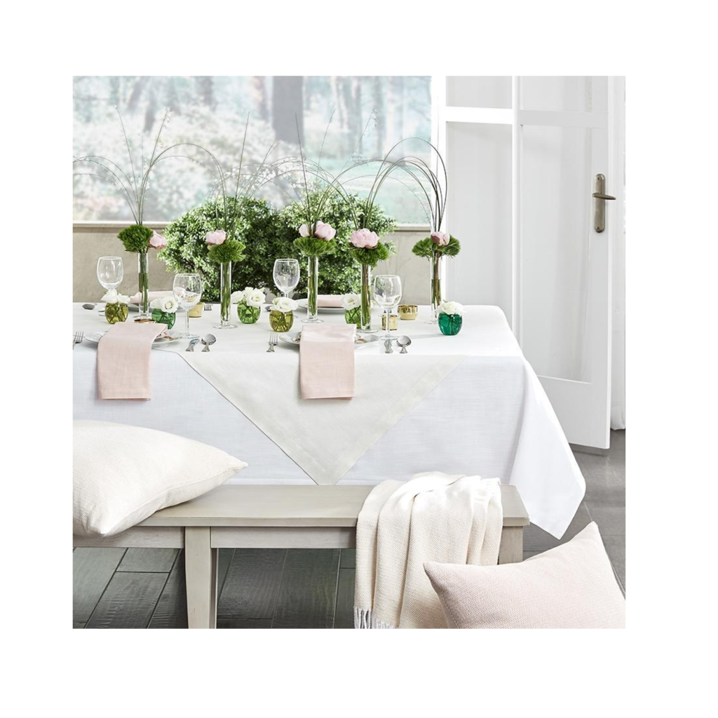 A plain square table cloth draped