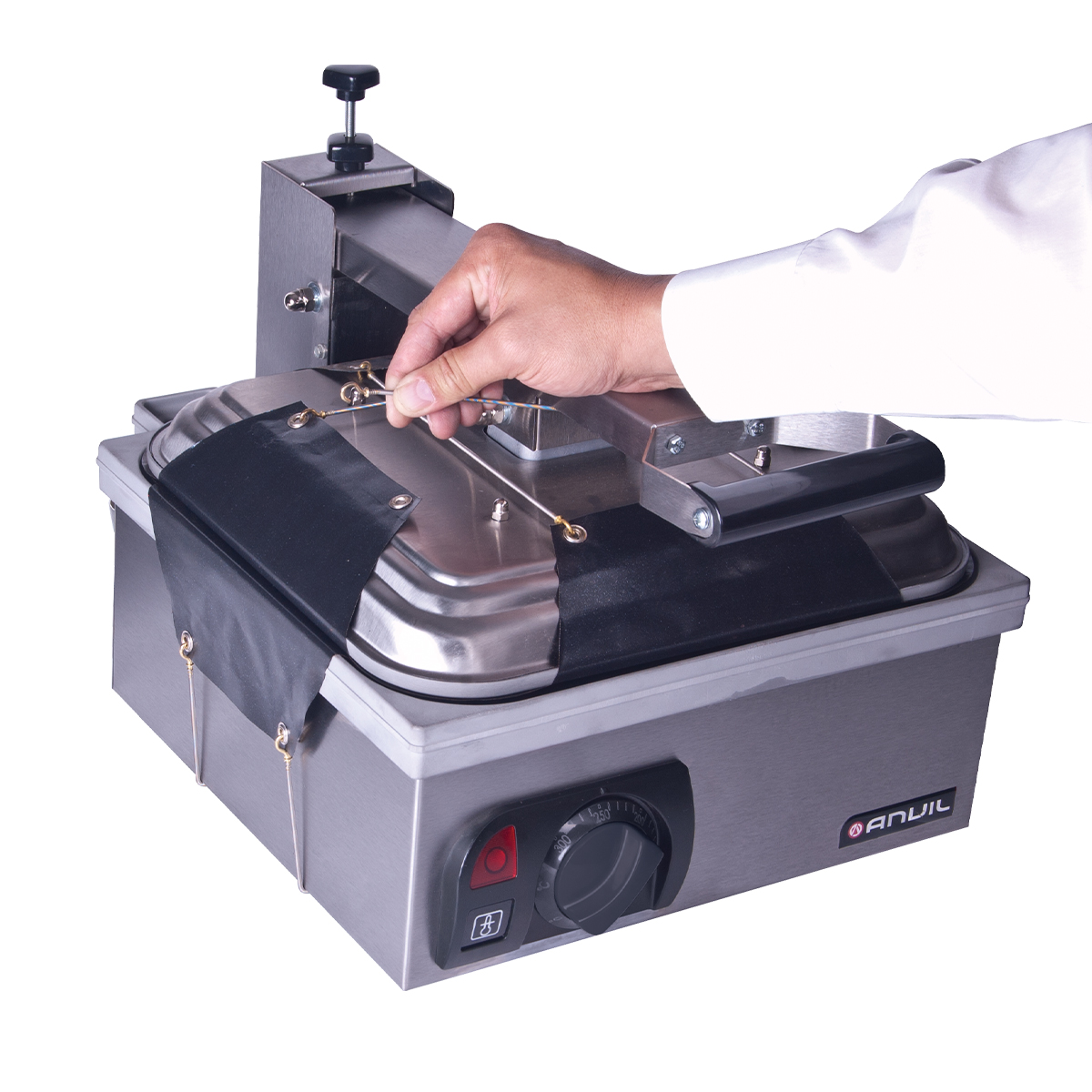 Flat plate toaster with installed teflon toaster cover.by Anvil.