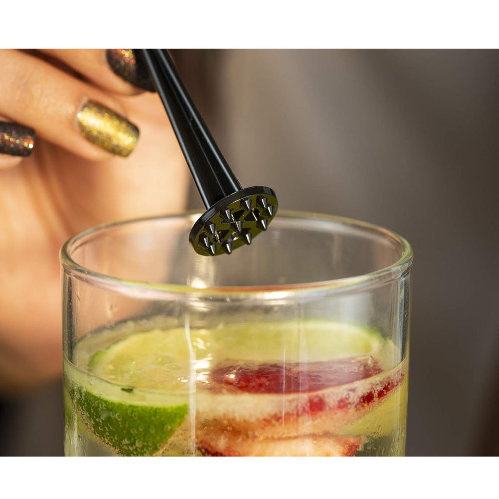 A plastic lemon mallet in use.