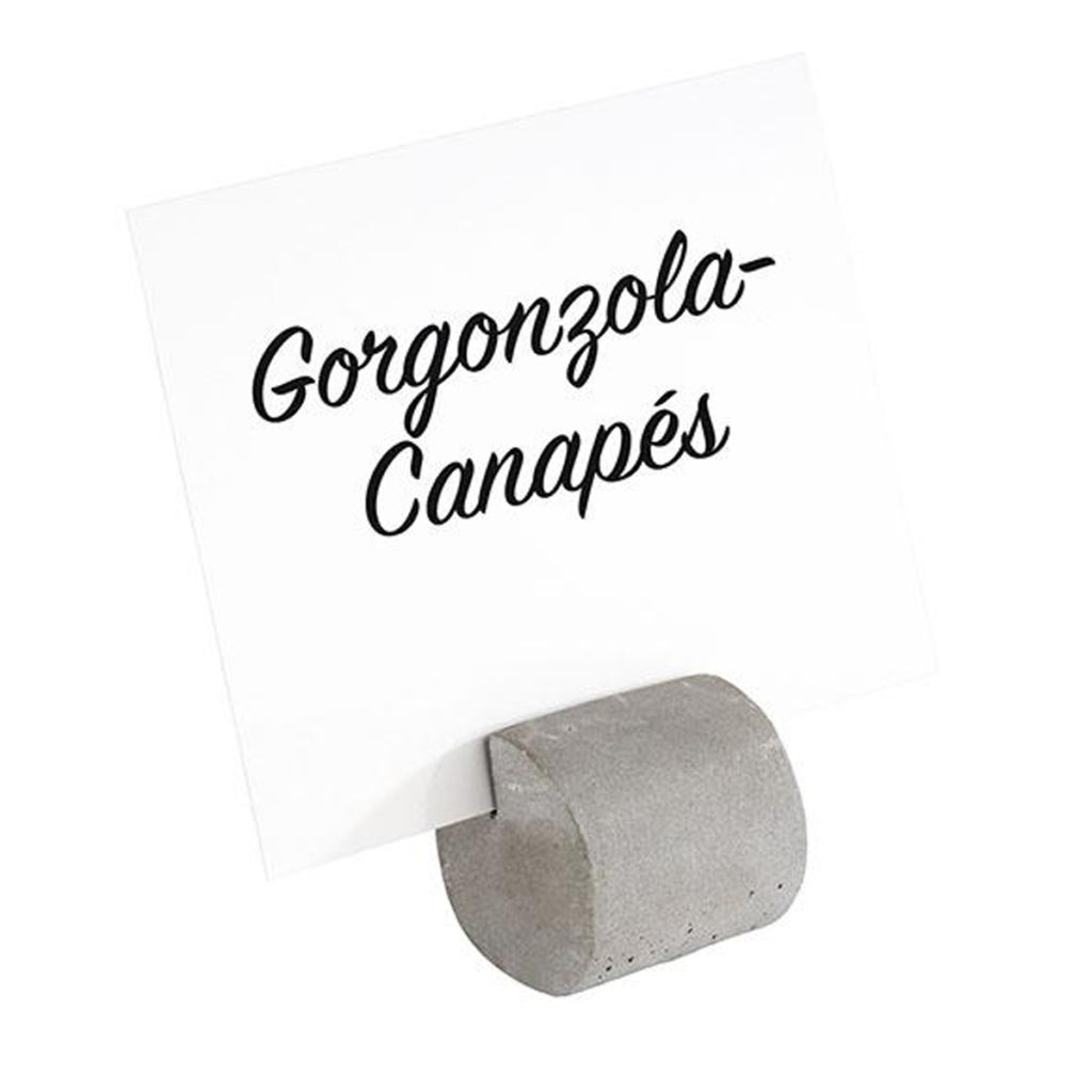 Circular cement menu holder by APS with label and wording.