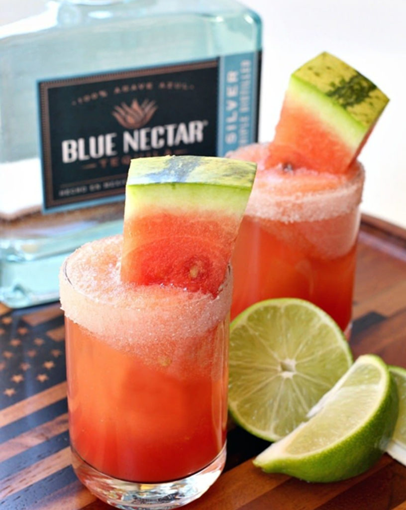 Watermelon shots with sugar rims.