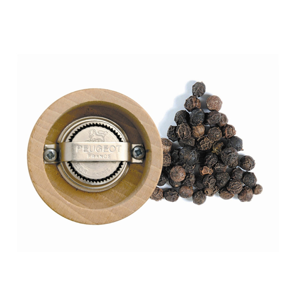 The grinding mechanism of the Paris natural wood grinder.