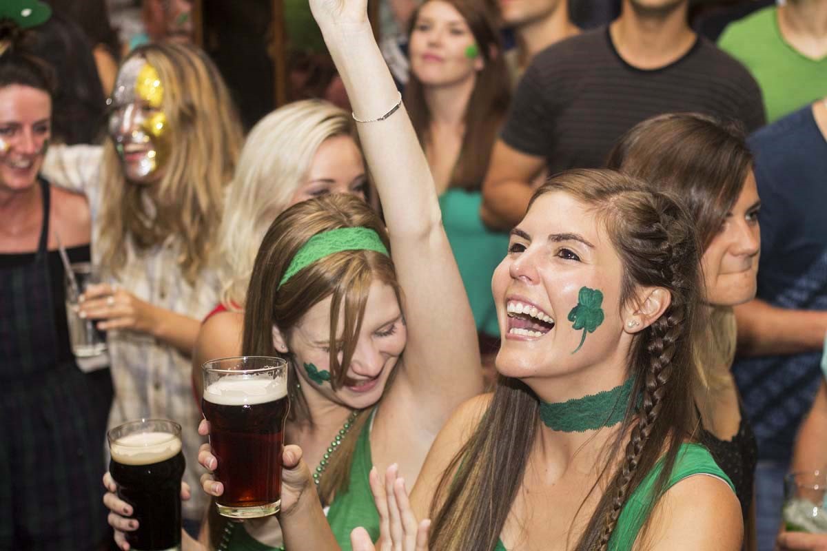 A group of people celebrating St Patrick's day at the Dubliner.